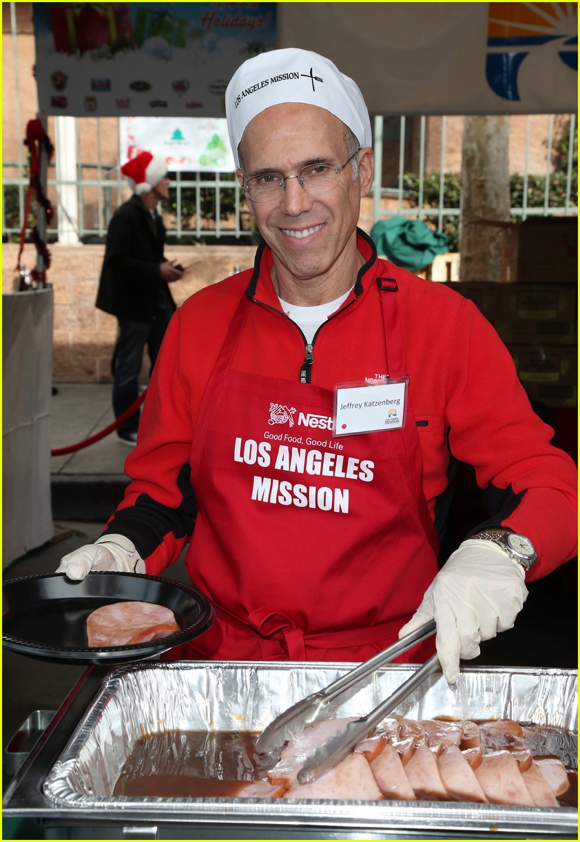 Emmy Rossum & Pharrell Williams Feed Homeless on Christmas Eve Photo