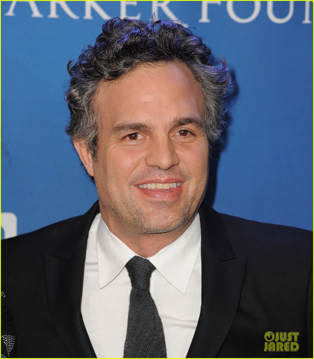 Pamela Anderson Brings Her Dapper Son Brandon Lee to Help Haiti Home