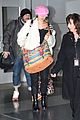 miley cyrus wears ring at airport 05