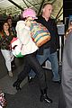 miley cyrus wears ring at airport 11