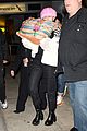 miley cyrus wears ring at airport 13