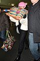 miley cyrus wears ring at airport 14
