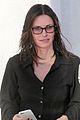 courtney cox hops in her black suv in la 01