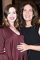 anne hathaway shows growing baby bump at armani pre oscar party 01