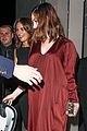 anne hathaway shows growing baby bump at armani pre oscar party 03