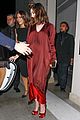 anne hathaway shows growing baby bump at armani pre oscar party 04