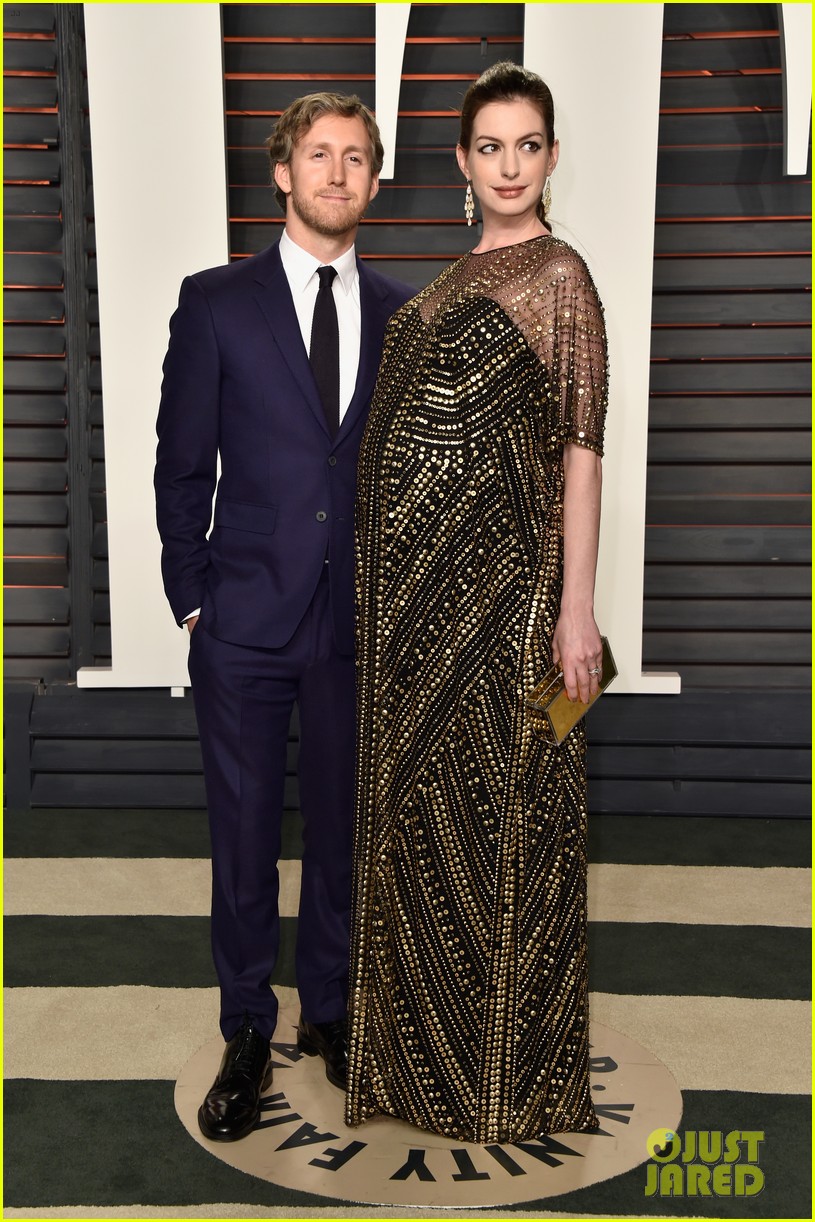 Pregnant Anne Hathaway Displays Baby Bump at Vanity Fair Oscars Party