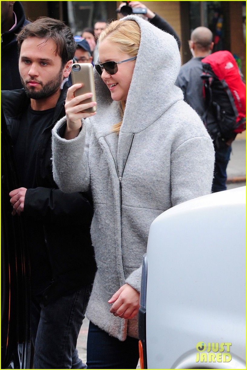 Amy Schumer Turns the Cameras on Photographers Watch Now! Photo