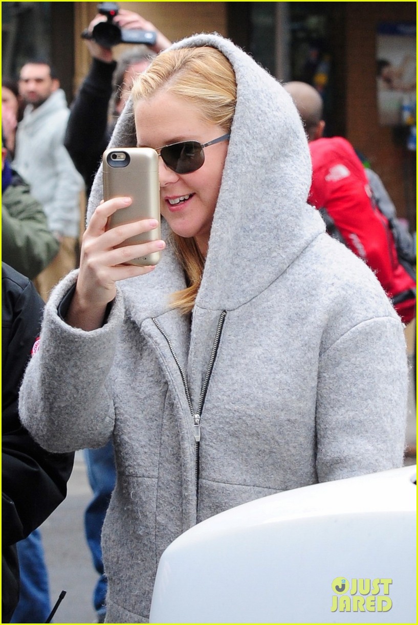 Amy Schumer Turns the Cameras on Photographers Watch Now! Photo