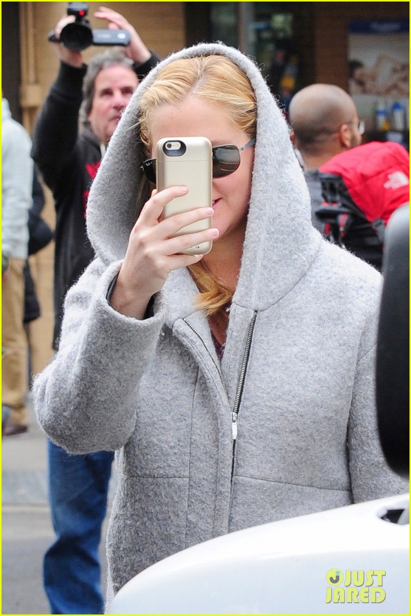 Amy Schumer Turns the Cameras on Photographers Watch Now! Photo