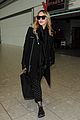 madonna flies into london 08
