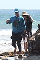 chris martin goes for malibu beach stroll with heather graham 08