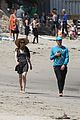 chris martin goes for malibu beach stroll with heather graham 13