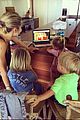 chris hemsworth holds his kids while they nap in his arms 04