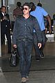brad pitt returns home to l a after le mans 24 hours 01
