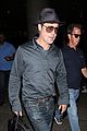 brad pitt returns home to l a after le mans 24 hours 04