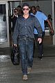 brad pitt returns home to l a after le mans 24 hours 07