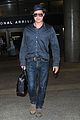 brad pitt returns home to l a after le mans 24 hours 08
