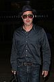 brad pitt returns home to l a after le mans 24 hours 12