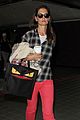 katie holmes goes solo upon arrival in los angeles 02