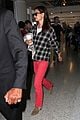 katie holmes goes solo upon arrival in los angeles 04