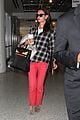 katie holmes goes solo upon arrival in los angeles 08