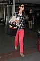 katie holmes goes solo upon arrival in los angeles 15