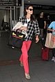 katie holmes goes solo upon arrival in los angeles 16