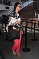 katie holmes goes solo upon arrival in los angeles 20