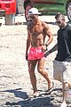 cristiano ronaldo wears brace on injured knee at the beach 05