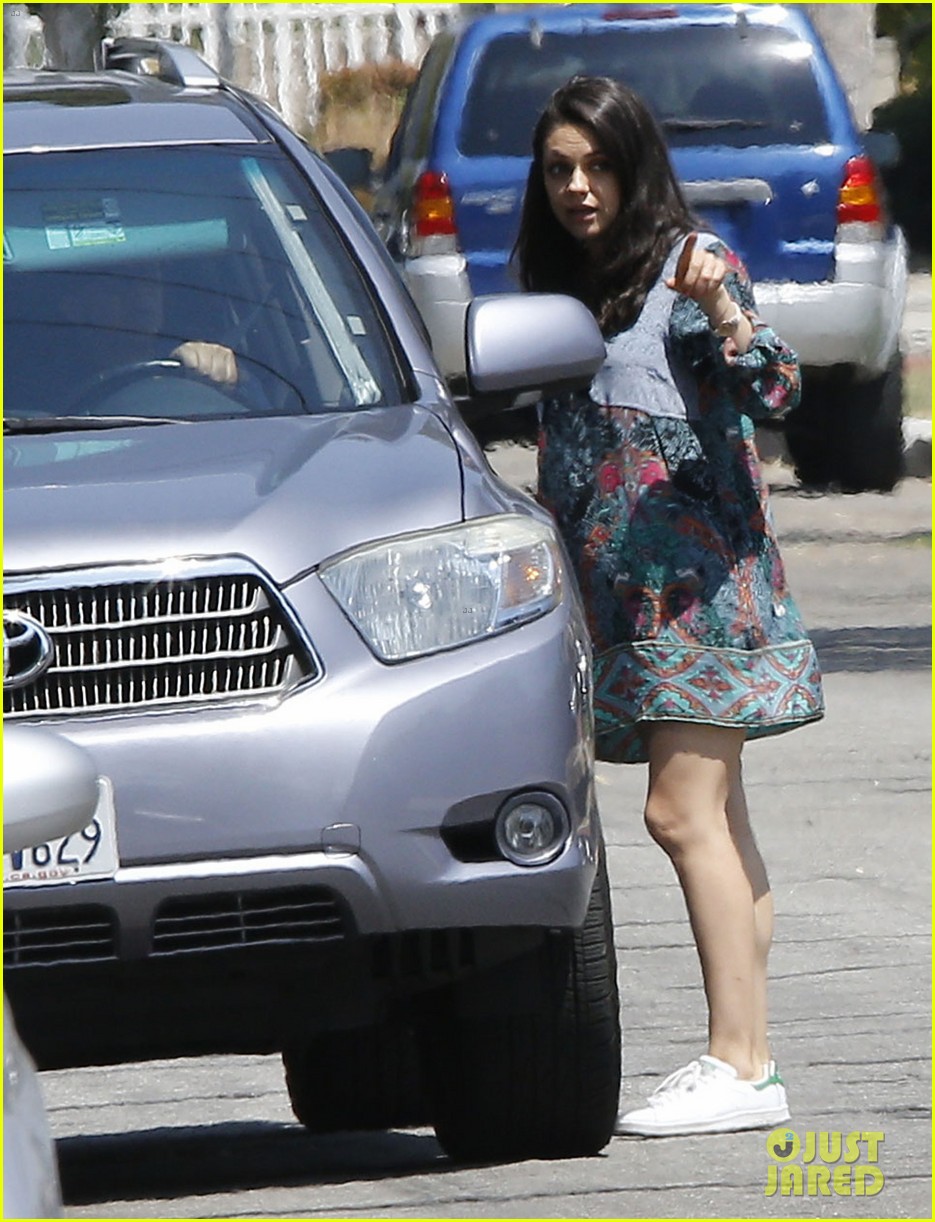 Mila Kunis Shows Off Her Growing Baby Bump While Out in Beverly Hills