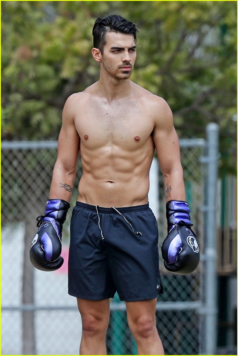 Joe Jonas goes shirtless while getting in a morning boxing session on Wedne...