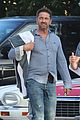 gerard butler carries towel malibu 02