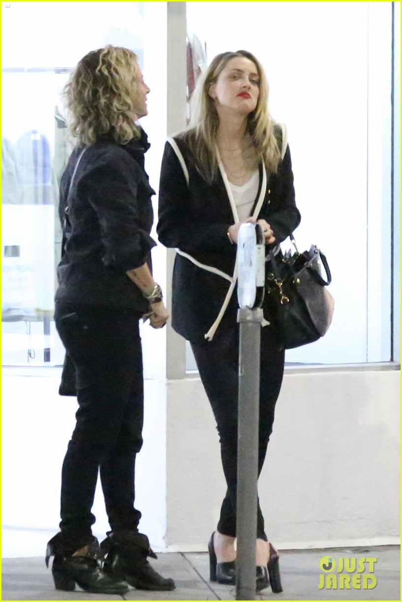 Amber Heard Enjoys Night Out Despite Ongoing Divorce Drama Photo