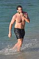 jake gyllenhaal goes shirtless on the beach 01