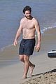 jake gyllenhaal goes shirtless on the beach 03