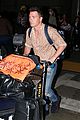 colton haynes flashes engagement ring at airport jeff leatham 05