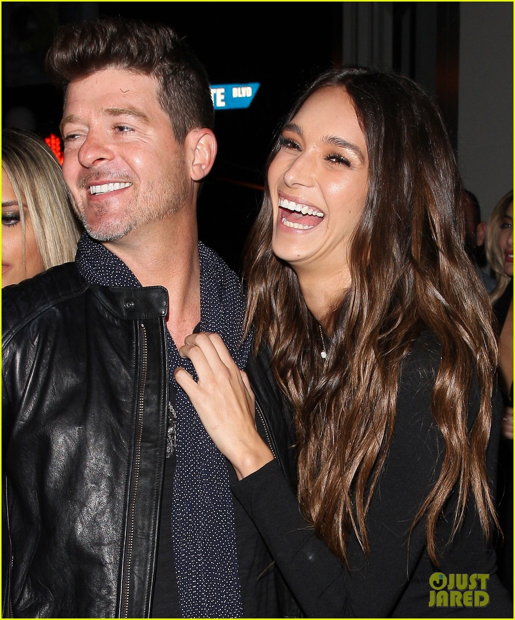Robin Thicke and his girlfriend April Love Geary share a cute moment togeth...