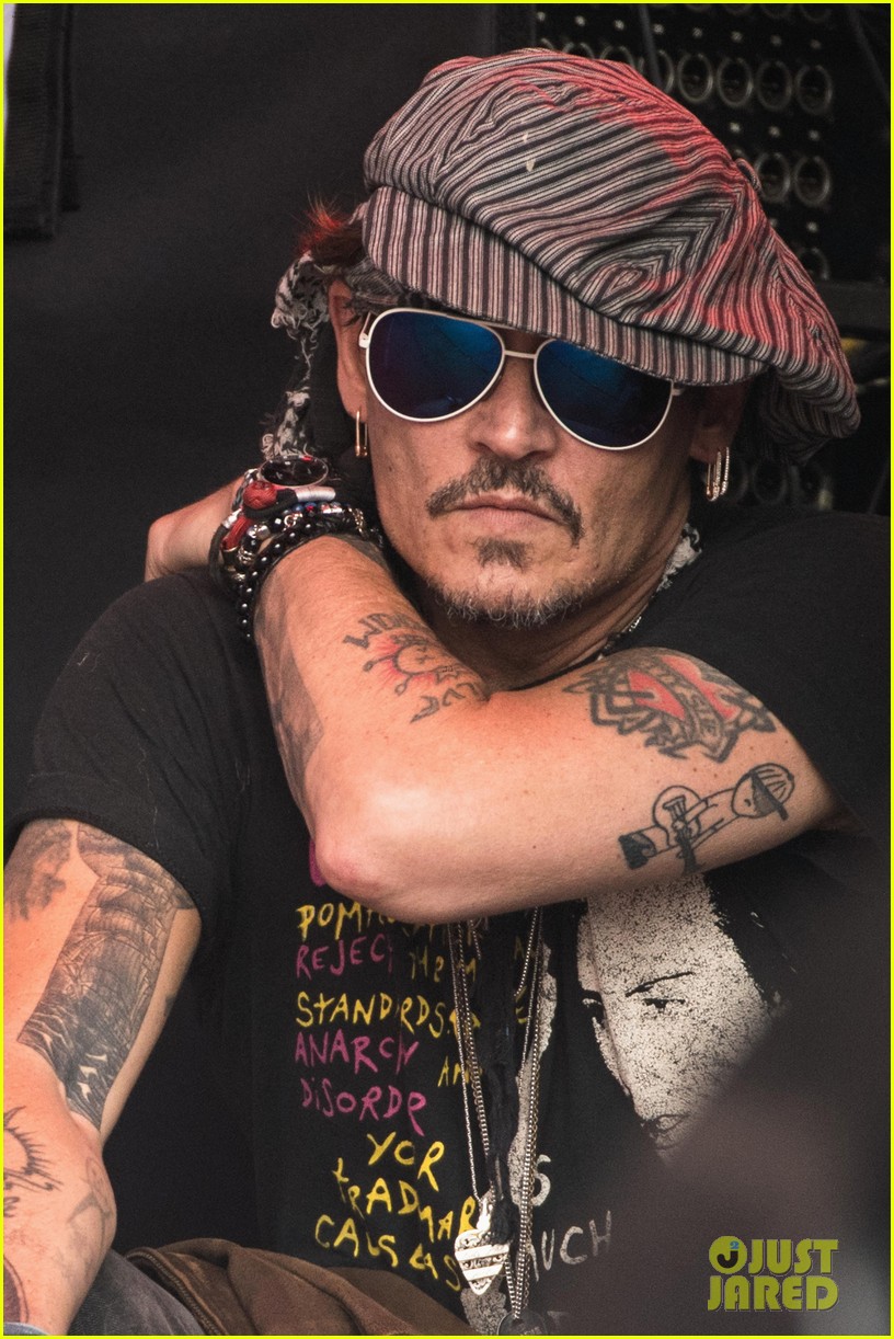 Photo: johnny depp takes in live music at glastonbury music festival