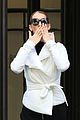 celine dion does yoga poses outside her paris hotel 02