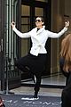 celine dion does yoga poses outside her paris hotel 03