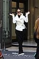 celine dion does yoga poses outside her paris hotel 14
