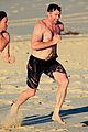 hugh jackman hits the beach with his speedo clad trainer 26