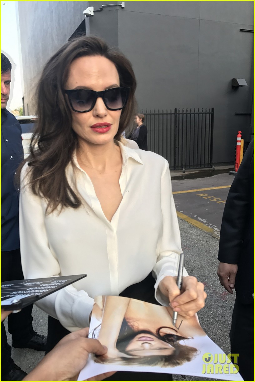 Photo: angelina jolie signs autographs 08 | Photo 3959952 | Just Jared