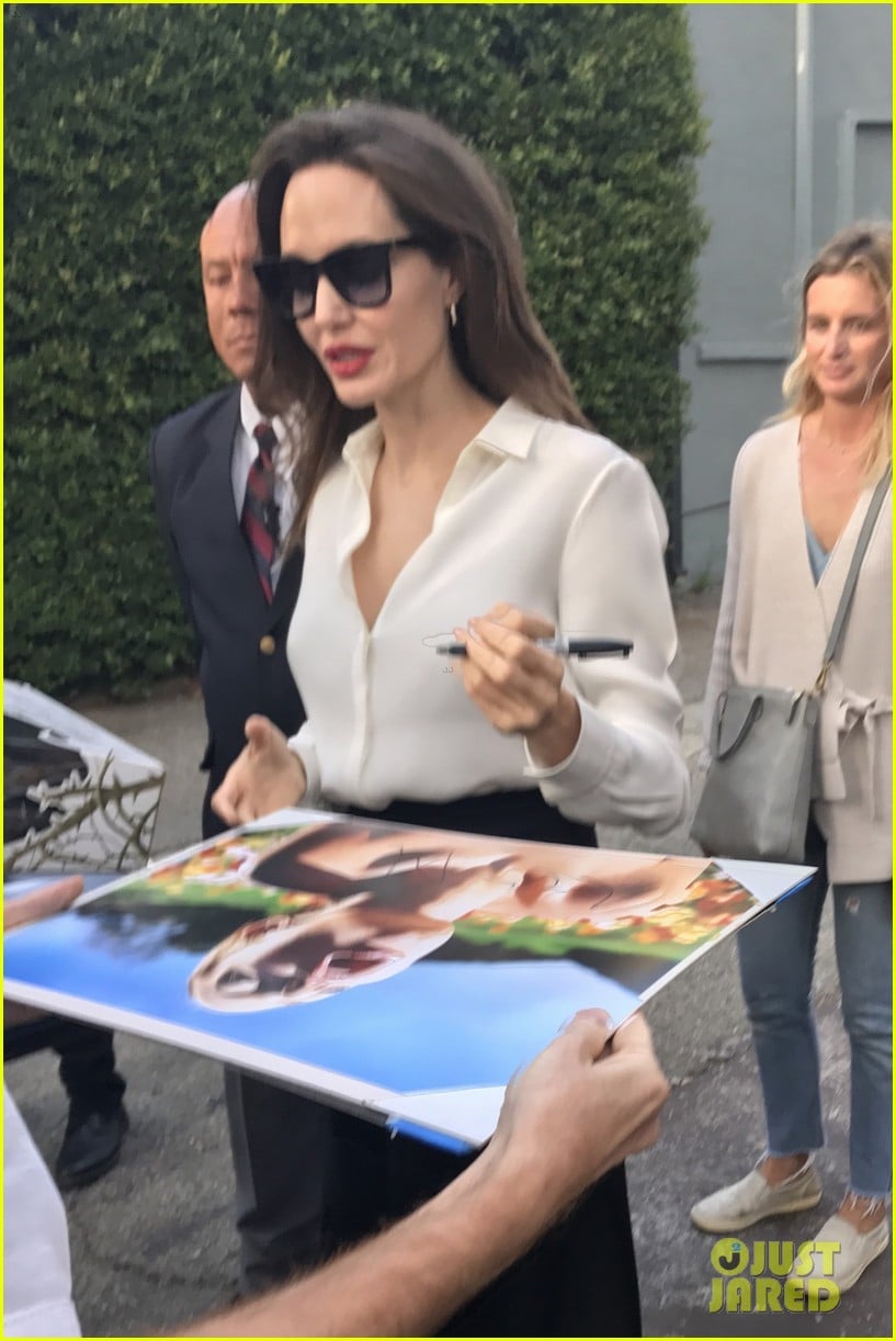 Photo: angelina jolie signs autographs 11 | Photo 3959955 | Just Jared
