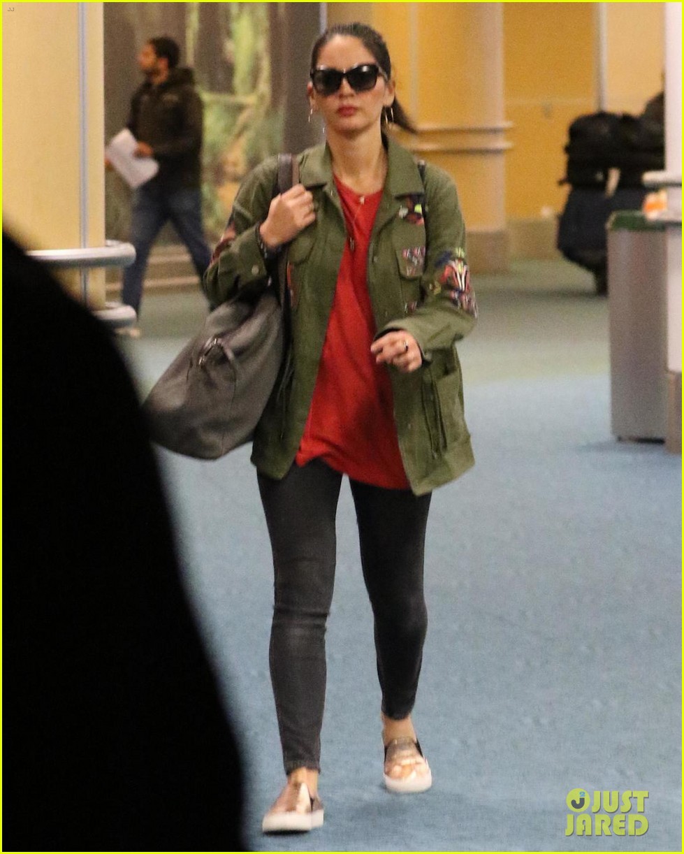 Olivia Munn Wears Army Green Jacket Through Vancouver Airport: Photo