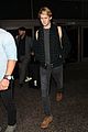 joe alwyn lands in los angeles in time for new years day 13