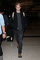 joe alwyn lands in los angeles in time for new years day 14