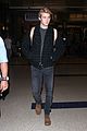 joe alwyn lands in los angeles in time for new years day 24