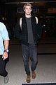 joe alwyn lands in los angeles in time for new years day 27